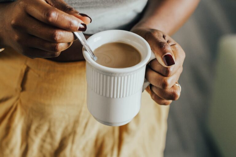 Woman drinking coffee - 1280x854