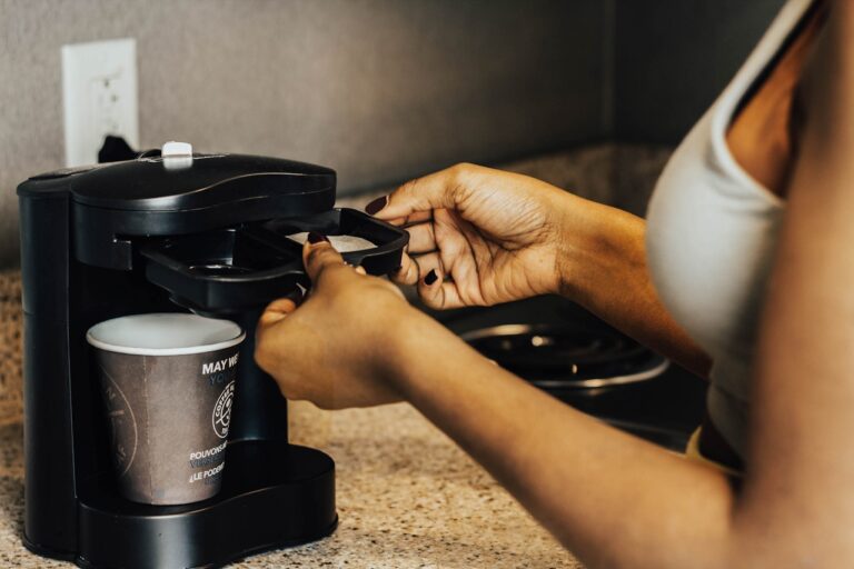 Woman making coffee - 1280x854